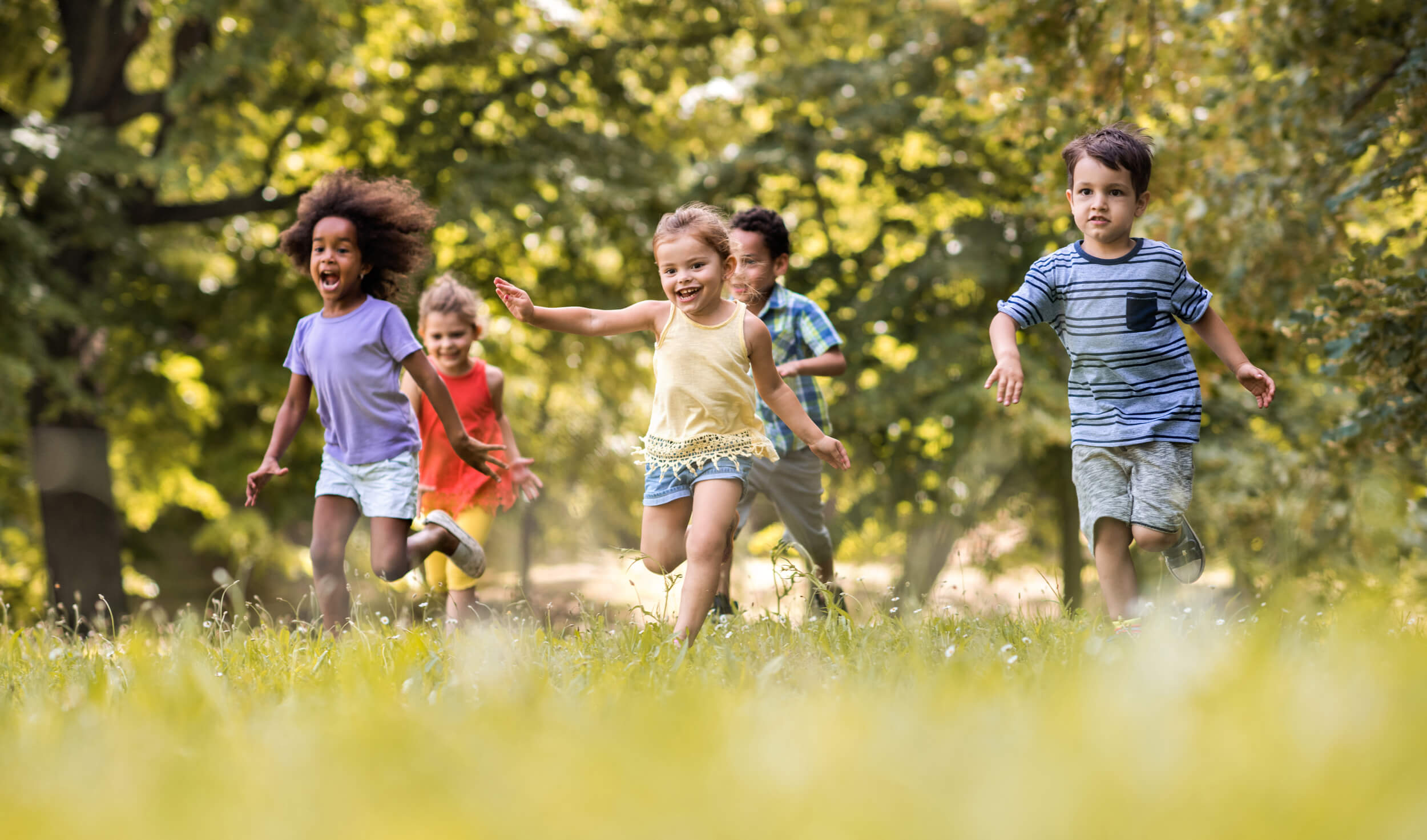 Children running and playing outdoors